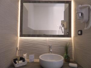 Koupelna v ubytování I Ginepri Hotel