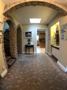 a hallway with an archway in a house at Beach Haven B&B in Tramore