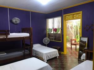 Cama o camas de una habitación en Casa Romano Hostel