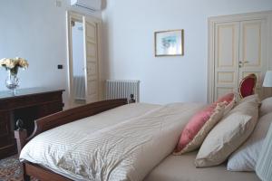 Posteľ alebo postele v izbe v ubytovaní Santa Domenica Guest House