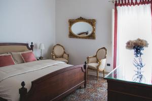 Posteľ alebo postele v izbe v ubytovaní Santa Domenica Guest House