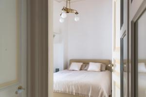 Posteľ alebo postele v izbe v ubytovaní Santa Domenica Guest House