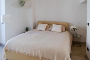 Posteľ alebo postele v izbe v ubytovaní Santa Domenica Guest House