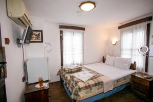 Кровать или кровати в номере The Tinkov house in Lovech