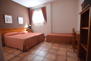 Postel nebo postele na pokoji v ubytování La Posada del Conde