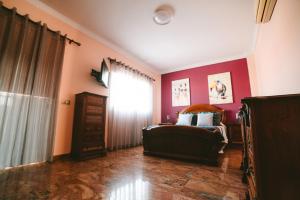 Postel nebo postele na pokoji v ubytování Villa Morada Sonneland con piscina privada climatizada + 31 fotografií