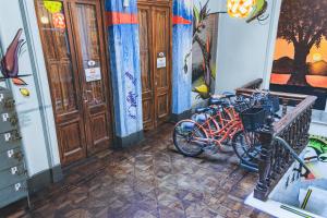a group of bikes parked in a room at Art Factory San Telmo in Buenos Aires