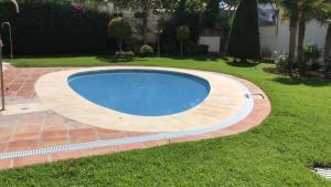 Bazén v ubytovaní Puerto Azul - EaW Homes alebo v jeho blízkosti