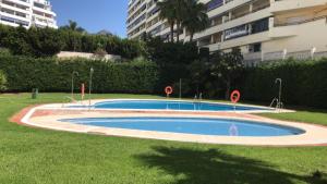Bazén v ubytovaní Puerto Azul - EaW Homes alebo v jeho blízkosti