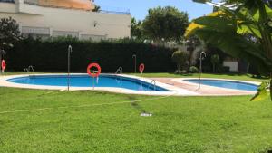 Bazén v ubytovaní Puerto Azul - EaW Homes alebo v jeho blízkosti