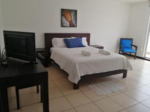Postel nebo postele na pokoji v ubytování Hotel Yurak