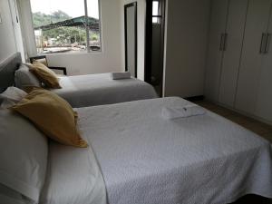 Postel nebo postele na pokoji v ubytování Hotel Yurak