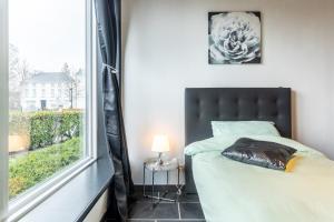 Postel nebo postele na pokoji v ubytování Homestay Gent-Merelbeke self check-in service
