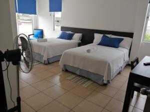 Postel nebo postele na pokoji v ubytování Hotel Yurak