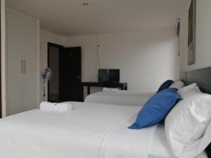 Postel nebo postele na pokoji v ubytování Hotel Yurak