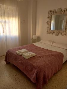 Posteľ alebo postele v izbe v ubytovaní Apartamento Avenida Andalucía Plaza