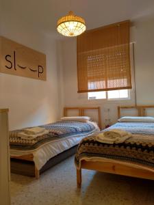 Posteľ alebo postele v izbe v ubytovaní Apartamento Avenida Andalucía Plaza