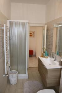 Koupelna v ubytování Maremma Holidays - Cimarosa Apartment + 6 fotografií