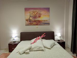 Postel nebo postele na pokoji v ubytování Central Square Apartment 1
