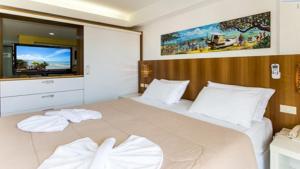 Ένα ή περισσότερα κρεβάτια σε δωμάτιο στο Sonia Flats Pipa's Bay - Flat 121 +34 φωτογραφίες