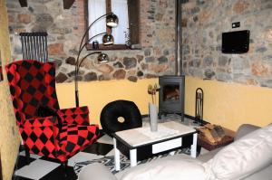 Posezení v ubytování Casas Rurales Entre Babia y La Luna