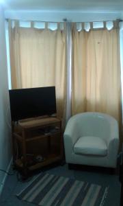 TV a/nebo společenská místnost v ubytování Habitaciones Florencia