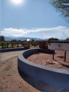 a roundabout with a sign in the middle of a road at Hotel Boutique Cañon de Talampaya in Villa Unión