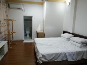 Postel nebo postele na pokoji v ubytování Fali Guest House