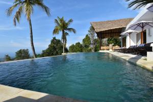Piscina a Bali Mimpi luxurious villa with great ocean views! o a prop