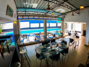 an overhead view of a restaurant with a swimming pool at Mariaariose - "Melody of the Sea" in Bogmolo