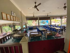 Ein Restaurant oder anderes Speiselokal in der Unterkunft Redang De' Rimba 