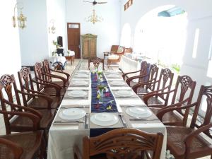A restaurant or other place to eat at Griya Asih