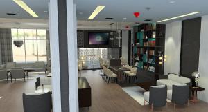 TV a/nebo společenská místnost v ubytování Edge Creekside Hotel