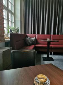 Posezení v ubytování Hotell Fängelset Västervik