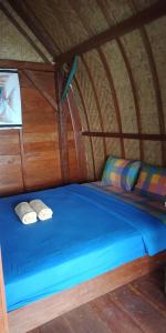 Postel nebo postele na pokoji v ubytování Eco-tourist Dreamstay Treehouse