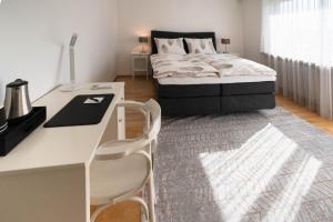 Postel nebo postele na pokoji v ubytování Aparthome L.I.N.Z.