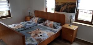 Ein Bett oder Betten in einem Zimmer der Unterkunft Ferienhaus Deubetal Nr.10