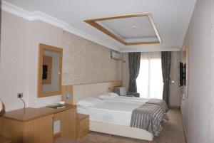 Кровать или кровати в номере Green Thermal Hotel
