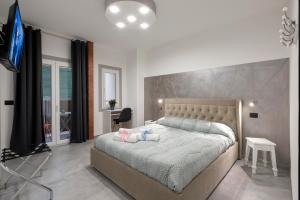 Postel nebo postele na pokoji v ubytování SABRILUNA ROOMS