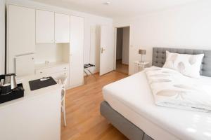 Letto o letti in una camera di Aparthome L.I.N.Z.
