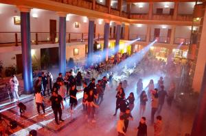 a crowd of people walking in a building at Hotel Russia in Tsaghkadzor
