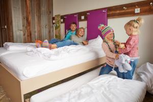 Postel nebo postele na pokoji v ubytování Explorer Hotel Neuschwanstein