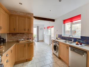 Køkken eller tekøkken på Sandsfoot Rest