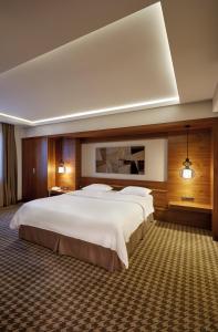 En eller flere senge i et værelse på Anemon Kent Ankara Otel