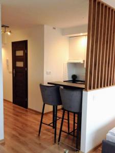 Kuchyňa alebo kuchynka v ubytovaní Alma Apartments Smolna
