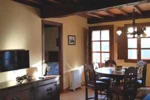 TV a/nebo společenská místnost v ubytování Casa la Capilla