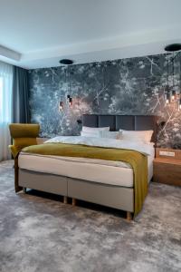 Postel nebo postele na pokoji v ubytování Hotel Esplanade Dortmund