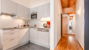 Kuchyň nebo kuchyňský kout v ubytování Appartement Berge