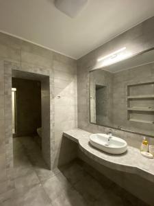 Koupelna v ubytování Hotel Obolon
