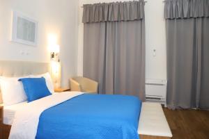 Un ou plusieurs lits dans un hébergement de l'établissement Hotel Belém Tejo - Setubalense